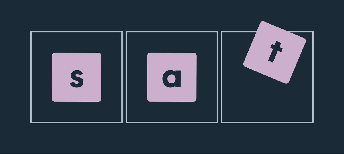 Three letter chips, s, a and t, with the t being set in place to build a word.